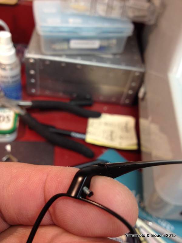 Taking a eyeglass frame apart.