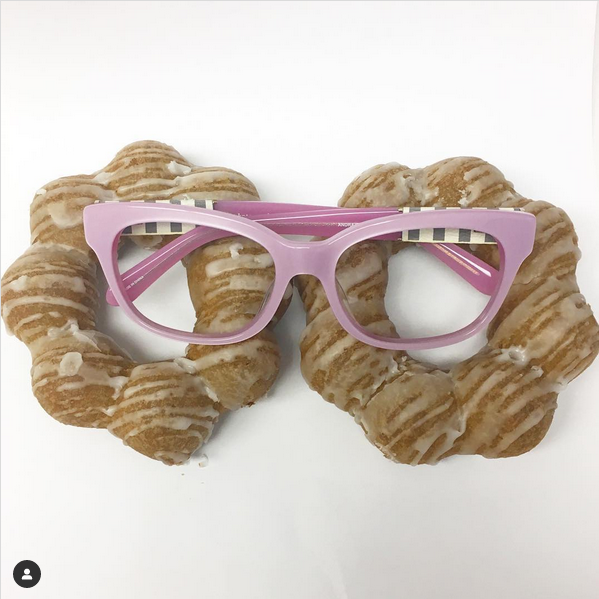 Kate Spade eyeglasses an a doughnut