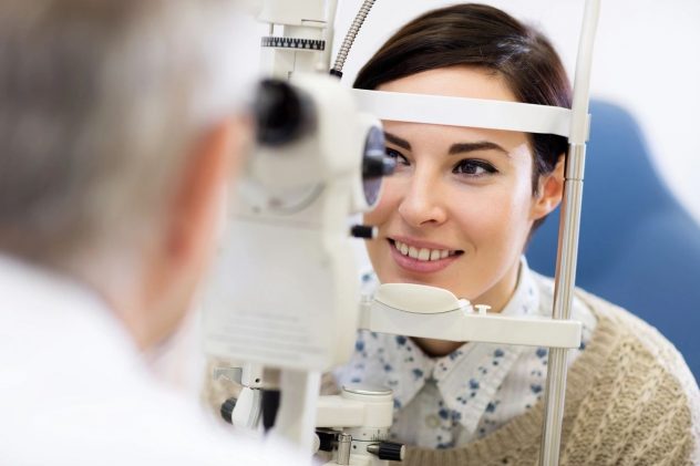 Woman getting an eye exam