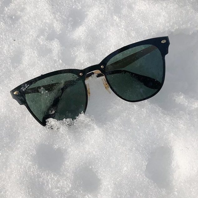 Ray Ban sunglasses on snow. 