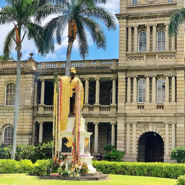 King Kamehameha statue, located in downtown Honolulu.  The statue is located across the street from the Iolani Palace.